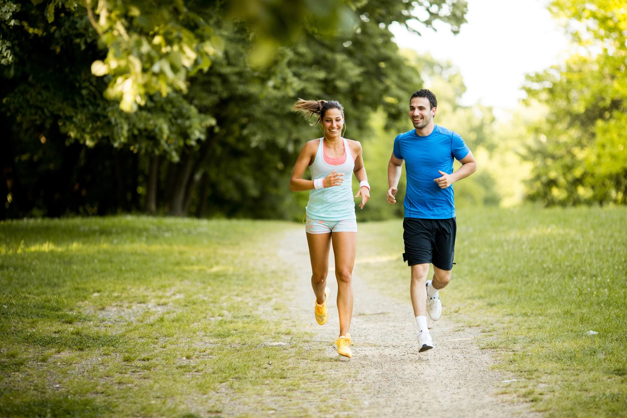 Active couple running outdoors